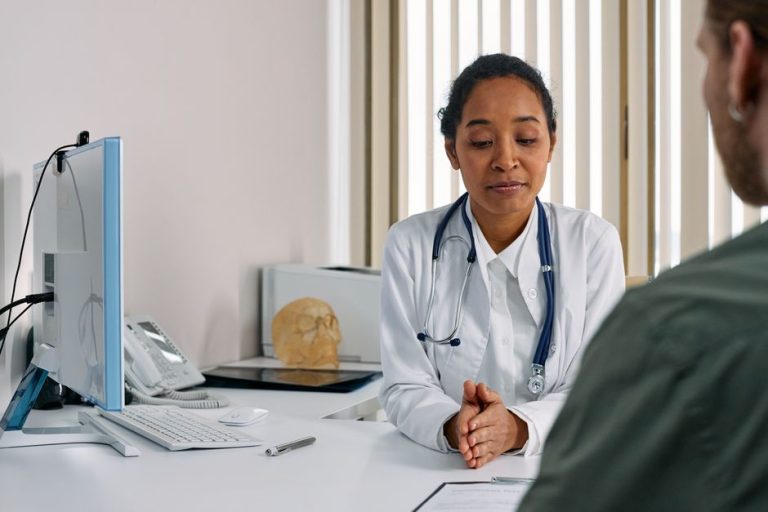 A woman speaking with her doctor